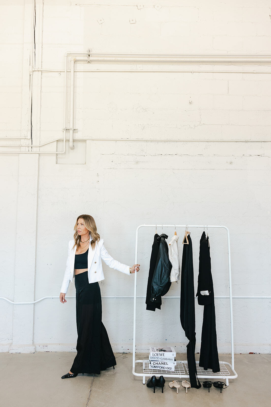 Callie styling session — curated wardrobe with rack, shoes, and designer references